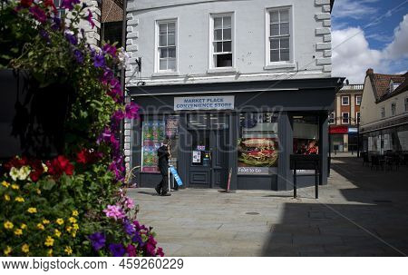 Grantham, Lincolnshire, England- August 2, 2022. Market Place Convenience Store Exterior View.