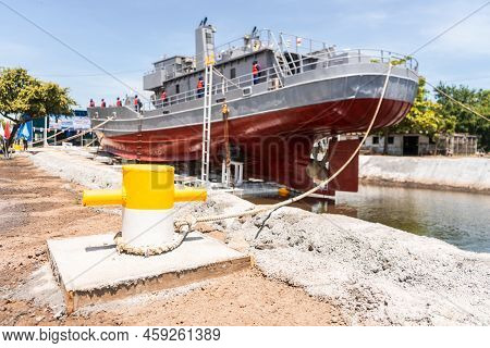 Coastguard In A Dry Dock Waiting To Receive Repair And Maintenance Work