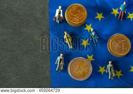 .tax And Price Increases In The European Union. Taxpayers Of Eu Countries.figurines Of People And Eu