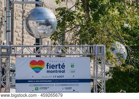 Montreal, Ca - 4 August 2022: Disco Ball And Sign For Montreal Pride Week 