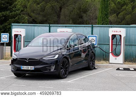 Bordeaux , Aquitaine  France - 07 25 2022 : Tesla Model X Charging Point Supercharger Car Station Fa