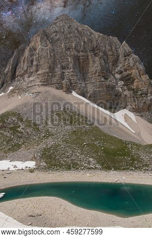Night View Of Pilato Lake And The Peak Of Mount Redentore In Italy