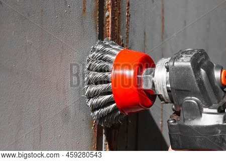 Removing Rust From Metal. Wire Brush On An Angle Grinder. Cleaning Of Metal From Corrosion.