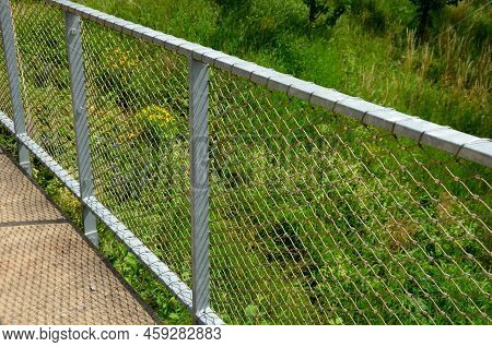 Terrace Fencing, Railings Of Metal Pipes Filled With Steel Cables Cable Mesh. Fencing Wire Stainless