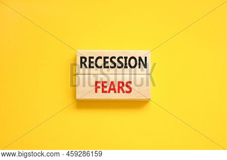 Recession Fears Symbol. Concept Words Recession Fears On Wooden Blocks On A Beautiful Yellow Table Y