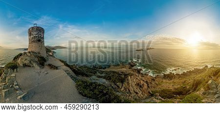 Tourist Woman Hiker Walking On Top In Punta Parata By The Sanguinaires Islands. Sunset Aerial 360 Pa