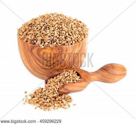 Utsho Suneli Seeds In Wooden Bowl And Spoon, Isolated On White Background. Trigonella Caerulea Or Bl