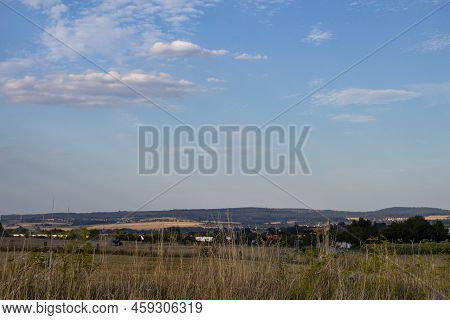 Panorama Of A Small German Village Calden Against A Blue Sky With Clouds