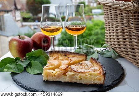 Tasting Of Baked Apple Cake And Strong Alcoholic Drink Calvados Made From Apples In Normandy, Calvad