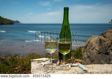 Tasting Of Txakoli Or Chacolí Slightly Sparkling Very Dry White Wine Produced In The Spanish Basque