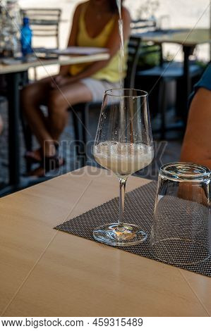 Drinking Of Txakoli Or Chacolí Slightly Sparkling Very Dry White Wine Produced In Spanish Basque Cou