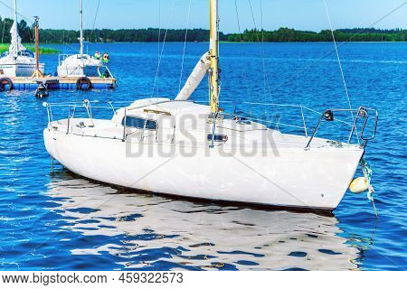 White Yacht With The Blue Sea Water At Summer Day.plateliai,lithuania.08-03-2022.