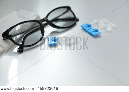 Single Dose Eye Drops, Glasses And Fabric On White Table. Space For Text