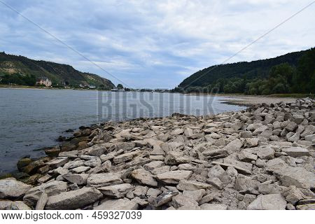 Wide Rhine In Low Water Level Summer With Ships In The Distance