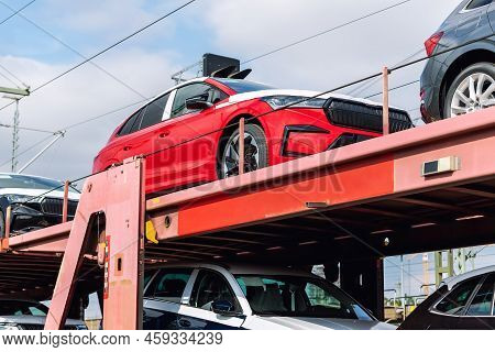Mane New Modern Electric And Fuel Cars Transportation By Cargo Freight Train Railway Wagon. Railroad