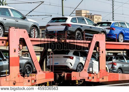 Mane New Modern Electric And Fuel Cars Transportation By Cargo Freight Train Railway Wagon. Railroad