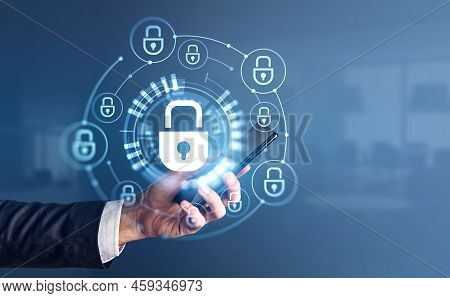 Businessman With Smartphone In Hand. Cybersecurity Hud Hologram With Glowing Lock Circuit, Office Bl