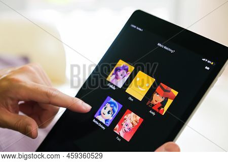 Bangkok, Thailand 3 May 2022. Selective Focus At People Hand While Using Remote Control To Select Us