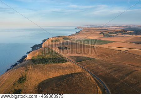 Stunning Aerial Drone Landscape Image Of Golden Hour Over Farmers Fields In South Downs National Par