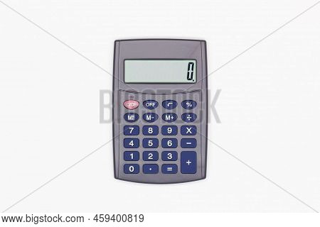 Calculator With Big Blue Buttons And Zero On The Digital Screen On A White Background. Solar Powered