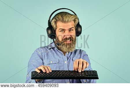 His Creative Office. Bearded Man Listen Headphones And Keyboard. Communication Concept. Support, Cal