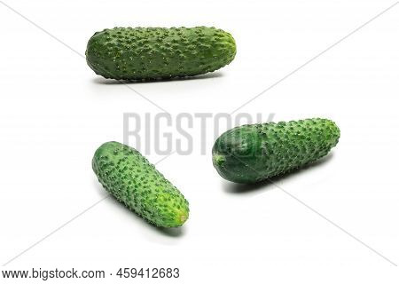 Fresh Green Cucomber Isolated On A White Background.
