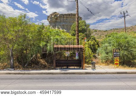 View Of Standard Bus Stop On Island Of Rhodes In Greece Against Backdrop Of Beautiful Mountain Lands