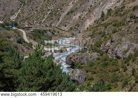 Mountain River High In The Mountains Of North Ossetia. Stormy Current.