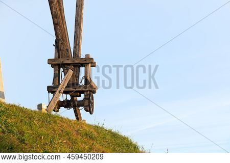 Early In The Morning There Is A Beautiful Windmill Whit The Sun Rising In The Sky