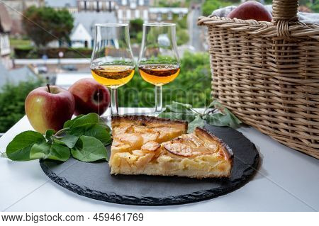 Tasting Of Baked Apple Cake And Strong Alcoholic Drink Calvados Made From Apples In Normandy, Calvad