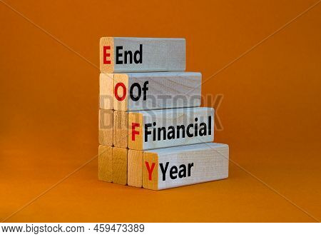 Eofy End Of Financial Year Symbol. Concept Words Eofy End Of Financial Year On Wooden Blocks On Beau