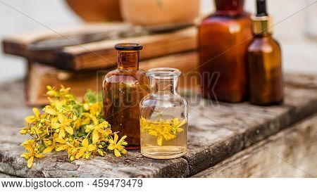 Hypericum Perforatum, St. Johns Wort Apothecary Bottles With Tincture And Essential Oils For Beauty 