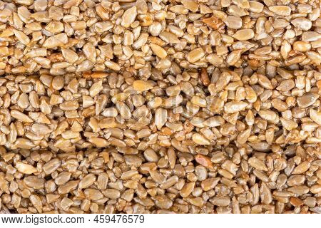 Full Frame Background And Texture Of Kozinak Tile From Seeds And Molasses. Delicious Oriental Sweets