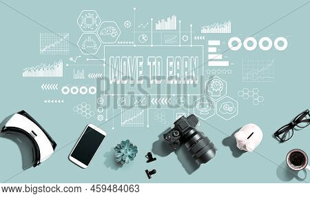 Move To Earn Theme With Electronic Gadgets And Office Supplies - Flat Lay