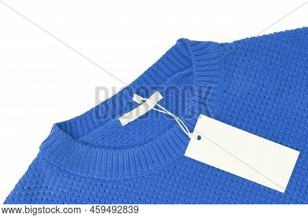 White Blank Rectangular Clothing Tag, Label Mockup Template On Blue Knitted Sweater Isolated On Whit