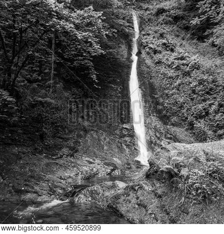 Long Exposure Of The White Lady Waterfall On The River Lyd At Lyford Gorge In Devon