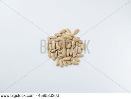 Brown Pills, Medicine Isolated On White Background, Top View