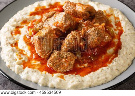 Turkish Food Hunkar Begendi Made With Eggplant And Meat Closeup In The Plate On The Table. Horizonta