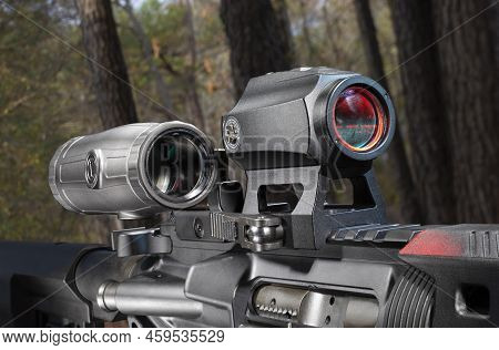 Magnifying Sight Swung Out Of The Way On An Ar-15 In The Forest