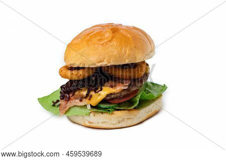 Homemade Hamburger With Cheddar And Onion Rings