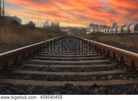 Straight Railway Lines In A Wonderful Sunset