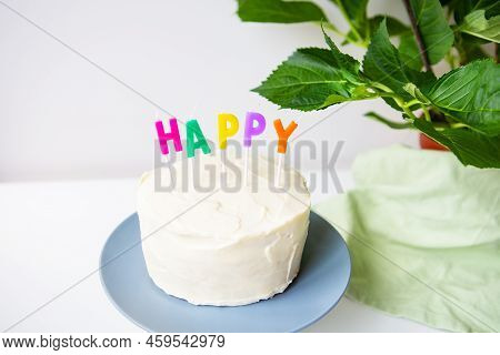 Birthday Cake, On A Creamy Biscuit The Inscription Happiness. Surprise Holiday And Birthday Concept