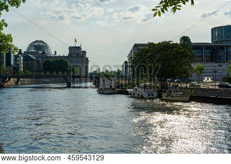Berlin, Germany 06.05.2022: View Of The Reichstag In Berlin And The Marschall Bridge Which Spans The