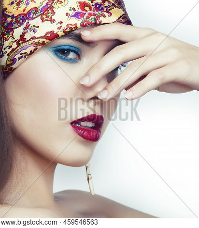 Young Pretty Modern Girl With Bright Shawl On Head Emotional Posing Isolated On White Background, As
