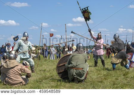 Tver Region, Russia - July 23, 2022: Individual Duel Of Two Medieval Spearmen On A Sunny Summer Day.