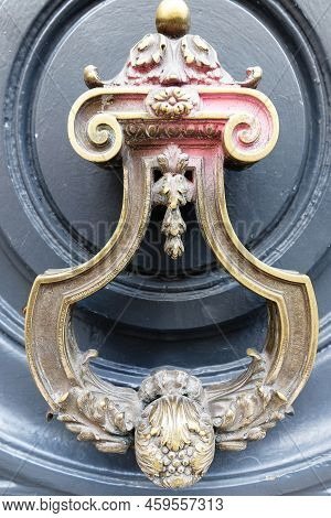European Vintage Old Metal Wrought Iron Door Knocker. Design Detail. Paris.