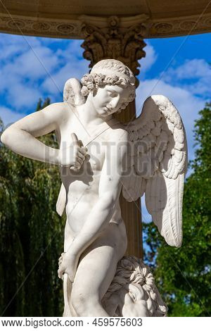 Versailles, France - September 8, 2019: This Is The Statue Of Cupid In The Gazebo Of The Temple Of L