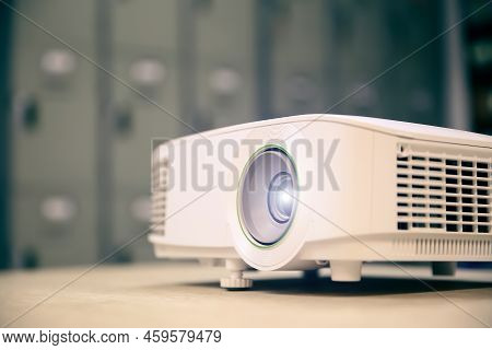 Close-up Computer Projector On Table Boardroom Or Meeting Room Technology Equipment Of Visual Or Vis