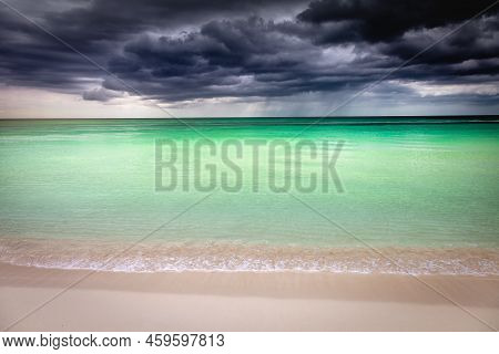 Dramatic Sky With Storm Clouds Over Caribbean Beach, Negril Seven Mile Beach, Jamaica
