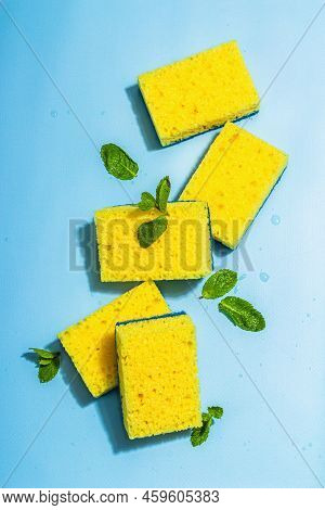 Bright Yellow Sponges For Washing Dishes. Organic Cleaning Concept, Minty Freshness